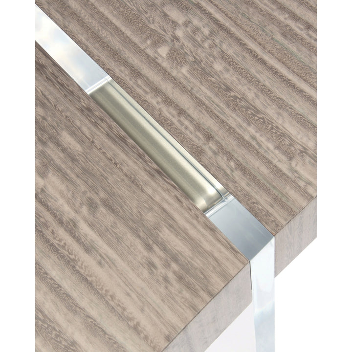 A closup of the John Richard Clichy home office desk's eucalyptus worktop, showing the acrylic slabs disecting the wooden surface.