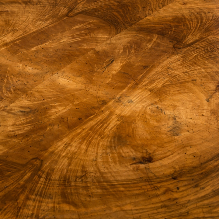 Closeup of the luxury curl walnut veneer finish on the John Richard Curved Walnut Desk.
