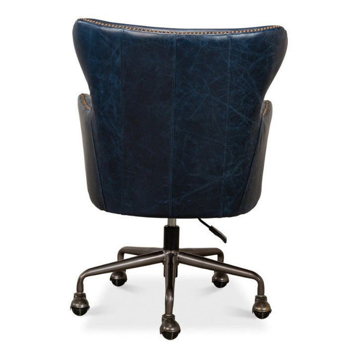 Back view of the Andrew Jackson Desk Chair from Sarreid in Chateau Blue, showcasing pure aniline top-grade cowhide leather, an adjustable height lever, a winged backrest, and a sturdy five-wheel metal base.