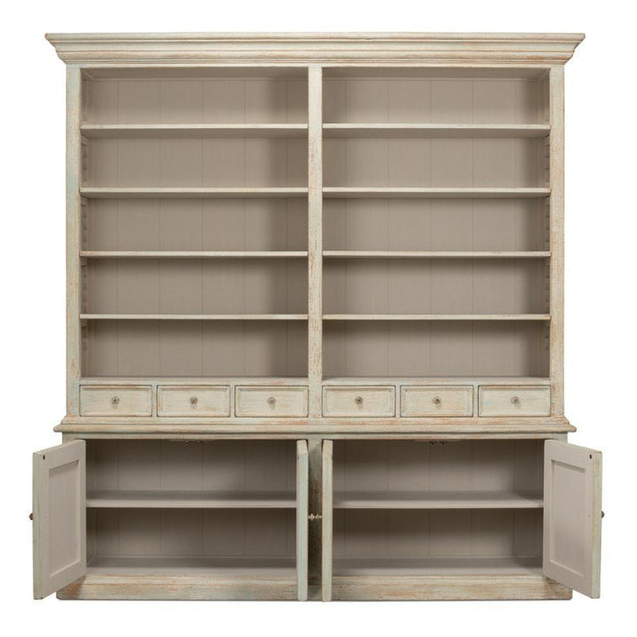 Introducing the Angelique Bookcase from Sarreid—a substantial, vintage-style piece artfully crafted from reclaimed pine with a distressed finish. This stunning bookcase boasts six spacious upper shelves, a row of six petite drawers below them, and four lower cabinet doors—two of which are open to reveal internal compartments that exude coastal charm.