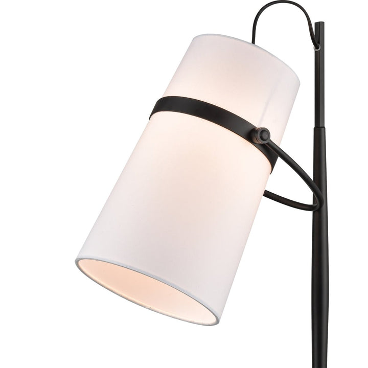 Introducing the Banded Shade 28'' High 1-Light Desk Lamp by Elite Home Office. This modern desk lamp showcases a white cylindrical shade atop a black stand, elegantly complemented by a marble base. The slightly downward-tilted shade merges sleek contemporary aesthetics with a touch of retro allure.