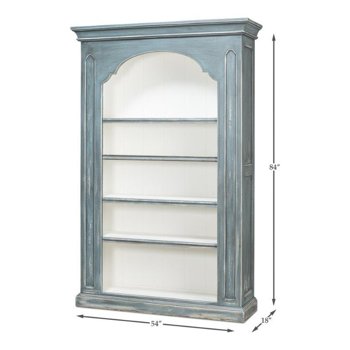 The Banner Bungalow Bookcase by Sarreid is a tall, vintage-style beauty with a distressed blue finish crafted from Russian pine. It features four wide shelves and an arched top frame, measuring 54 inches wide, 18 inches deep, and 84 inches tall—an elegant addition to the Bungalow Collection.