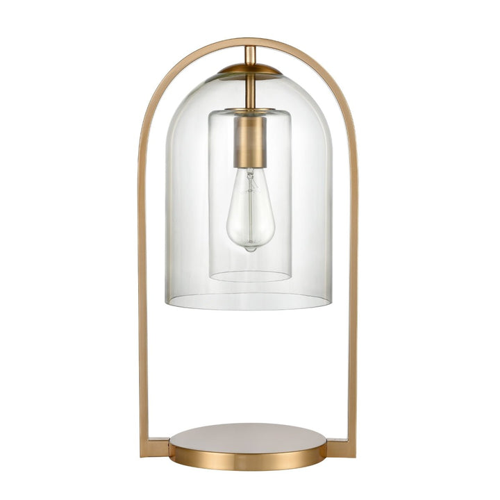 Introducing the Bell Jar 28'' High 1-Light Desk Lamp by Elk Home, a perfect blend of modern farmhouse style. Its aged brass frame complements a glass dome encasing an exposed bulb. The lamp features a circular base and sleek, minimalist design, adding timeless elegance to any space.