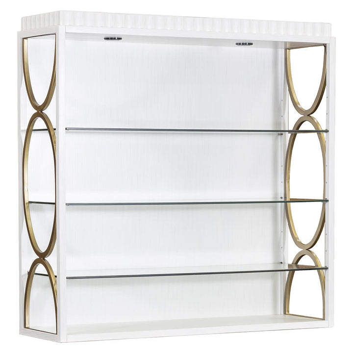 Introducing the East Camden Deck by Fairfield Chair, a sleek and contemporary white wall shelf unit with a sophisticated pearl finish. This modern piece features three evenly spaced glass shelves, accented by decorative gold ovals on the sides and a ridged pattern along the top edge. The unit is further enhanced with three-way touch lighting, adding an elegant touch to its design.