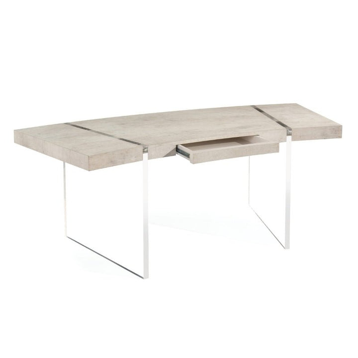 Introducing the John Richard Loftus Desk 77": a modern, minimalist desk from John Richard with a light wooden top and sleek, metallic legs. The desk features a central pull-out drawer and has a wide rectangular surface with clean lines, highlighted by its rich tiza gesso finish for an added touch of contemporary design.