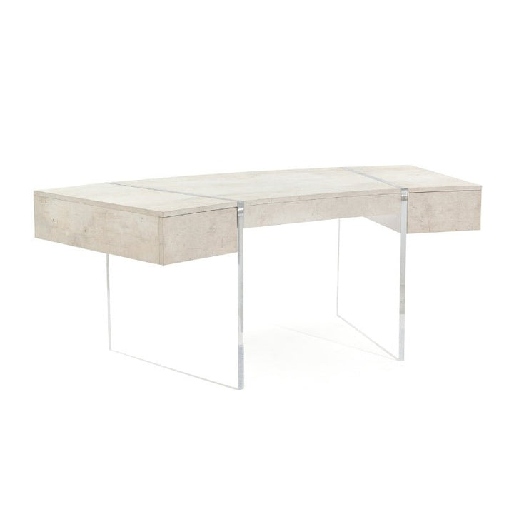 The John Richard Loftus Desk with Side Drawers 77" by John Richard is a modern, luxury curved desk with a light wooden top and minimalist design. It features thin, transparent legs made of glass or acrylic, giving it a sleek and contemporary look. This simple and functional piece is perfect for creating a stylish home office workspace.