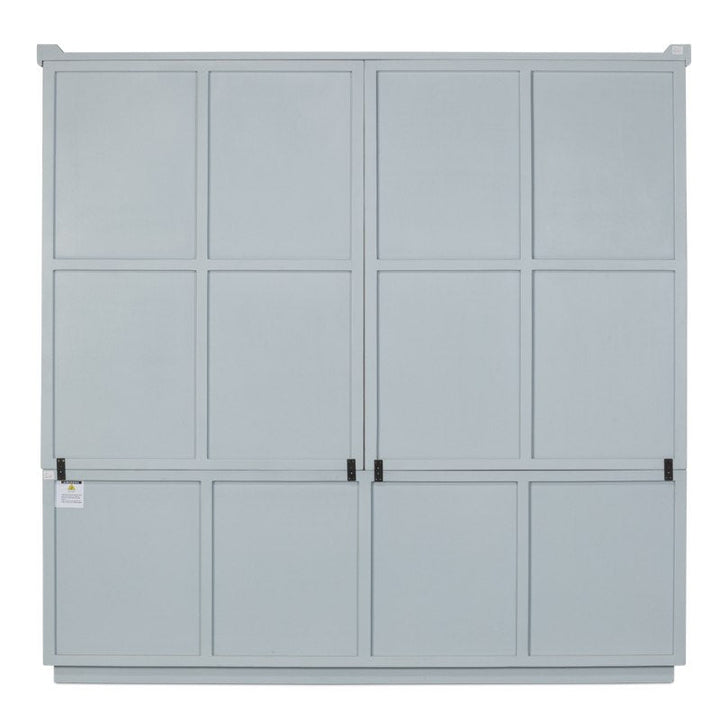 A rectangular, light gray cabinet with a paneled design crafted from reclaimed oak. The front features symmetric square panels, with two small black latches in the center. A small tag is visible on the left side. The overall design of this Maldives 4 Door Bookcase, Eros Blue by Sarreid is simple and functional.