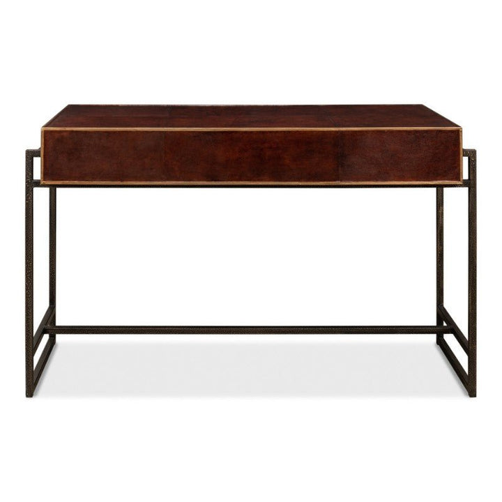 The Old Leather Desk by Sarreid showcases a modern minimalist design with a flat, rectangular wooden top in a dark finish. Supported by a sleek metal frame with a rectangular base, this 49-inch desk offers an open and airy look that seamlessly blends transitional style for versatile decor options.