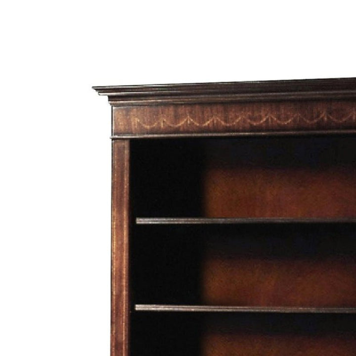 The image shows the upper section of an Open Mahogany Bookcase from Aston Court, featuring ornate trim at the top and three visible shelves that showcase elegant craftsmanship. This exquisite piece stands against a plain white background, offering generous storage with style.