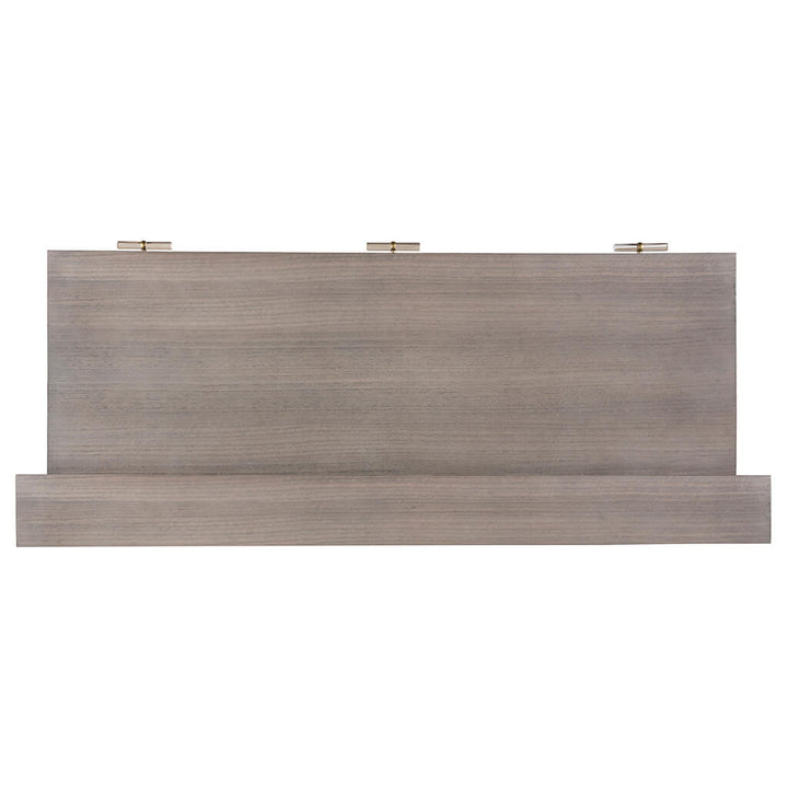 A flat, rectangular piece of eucalyptus wood with a gray finish features a horizontal ledge at the bottom and three small metal hinges at the top. The wood has a smooth texture and uniform grain, making it a refined addition to your home office or Park Avenue Desk - Fairfield Chair by Fairfield Chair.