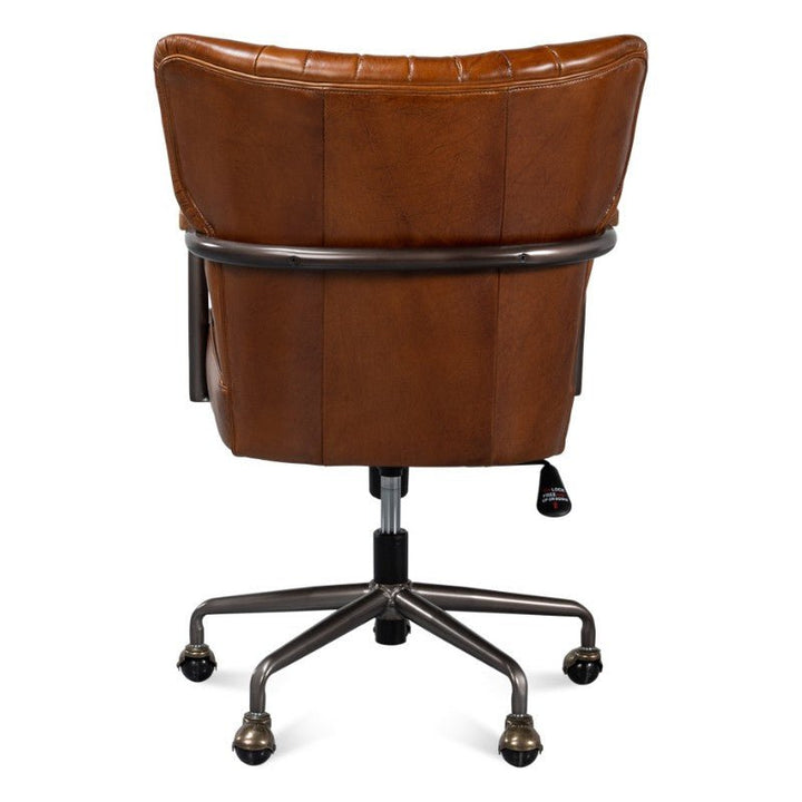 Here's the back view of Sarreid's Parker Office Chair, elegantly upholstered in luxurious Vintage Havana Leather. It boasts a sturdy metal frame and a wheeled base for easy movement, enhanced by its tufted design. The chair is equipped with a height adjustment lever and five caster wheels for added mobility.