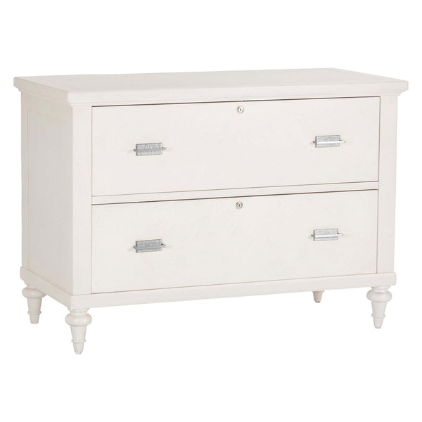 The Portofino Lateral File Cabinet by Fairfield Chair radiates coastal elegance with its white wooden construction. It features two large drawers, each equipped with metallic handles and label slots, and stands on four short, tapered legs. This simple yet classic piece perfectly complements any space.