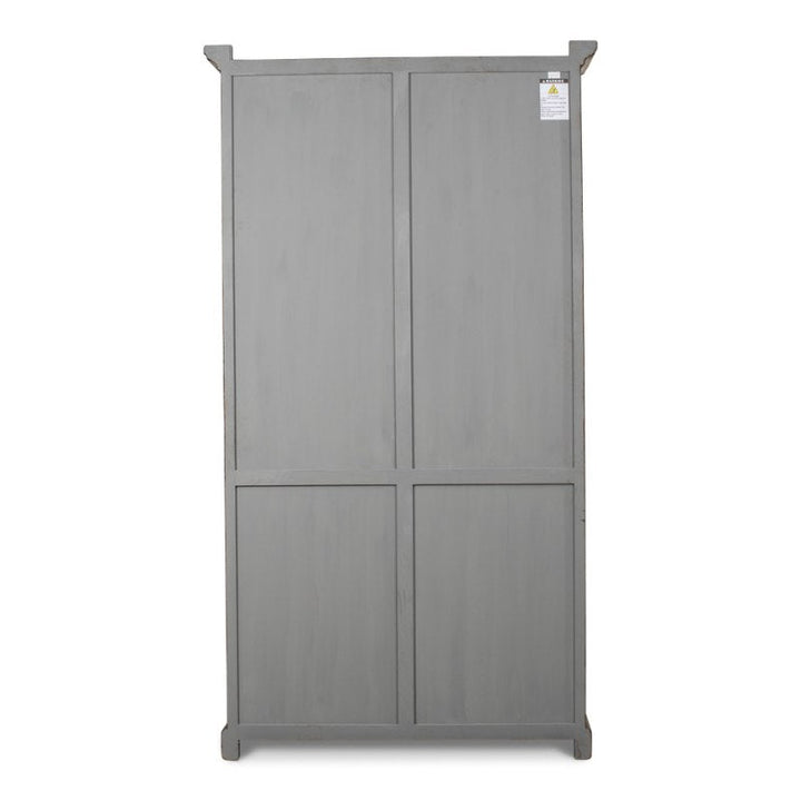 The "Refined Arches Tall Bookcase" by Sarreid is a tall, gray wooden cabinet featuring two large panels on the top and two smaller ones below, reminiscent of traditional style bookcases. Its minimalist design includes a small label on the upper right corner. The cabinet stands gracefully against a white background.