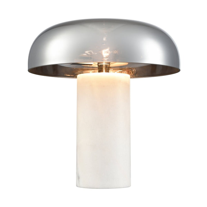 Introducing the Regina 13.5'' High 2-Light Desk Lamp by Elk Home, a contemporary table lamp with a stylish design, boasting a metallic mushroom-shaped shade and a cylindrical white marble base. When illuminated, it emits a warm glow that beautifully reflects off its shiny metallic surface.