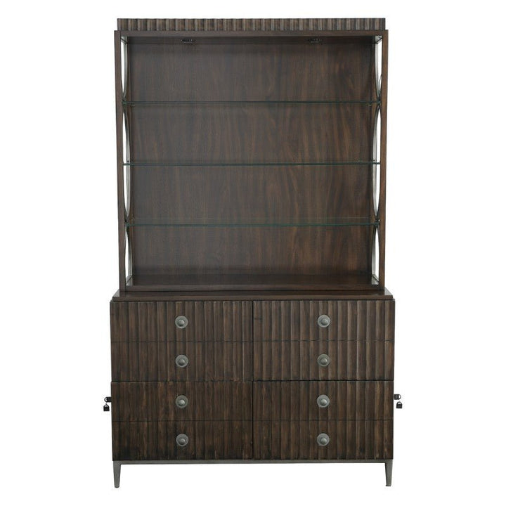 An image of the West Camden Deck - Fairfield Chair by Fairfield Chair, a tall wooden display cabinet featuring adjustable glass shelves on the top half and a closed bottom section with three drawers on each side. The cabinet boasts a dark Tahitian Pearl finish with ridged texture on the drawer fronts.